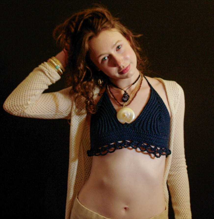 model wearing handmade crochet piece