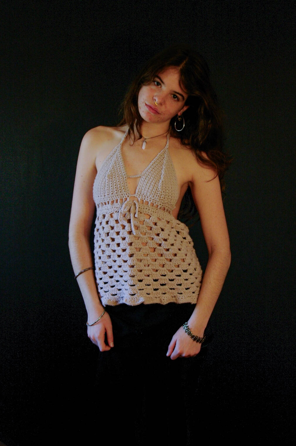 model wearing handmade crochet piece