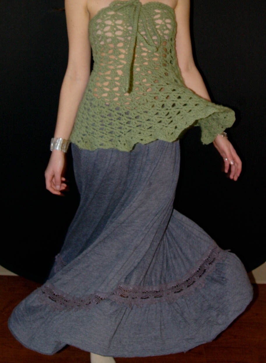 model wearing handmade crochet piece