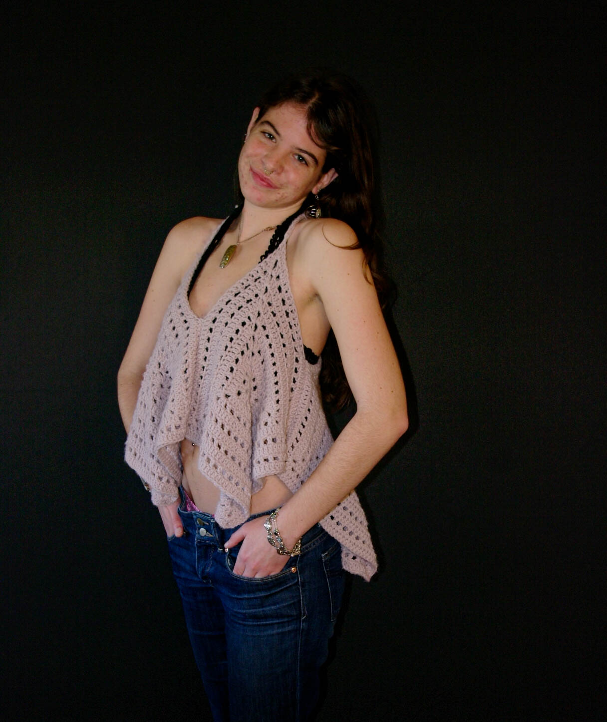 model wearing handmade crochet piece