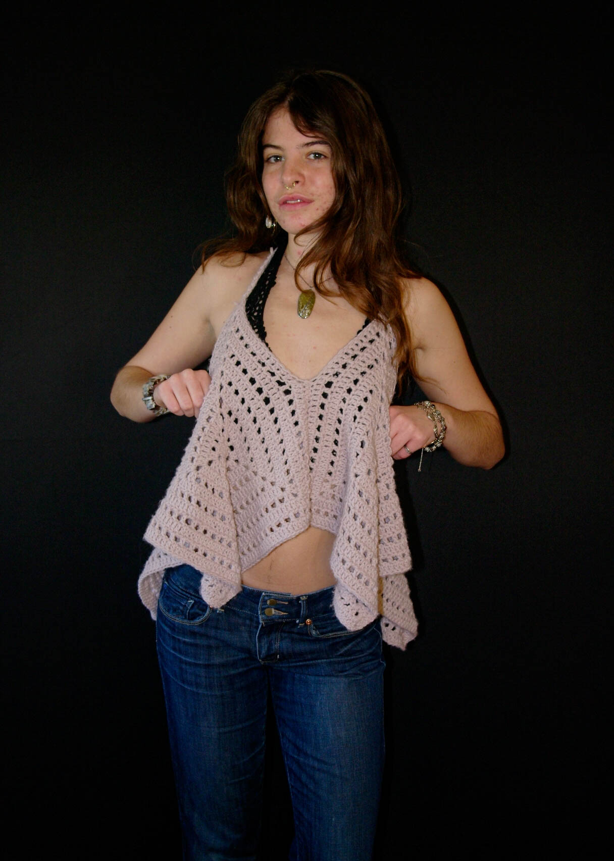 model wearing handmade crochet piece