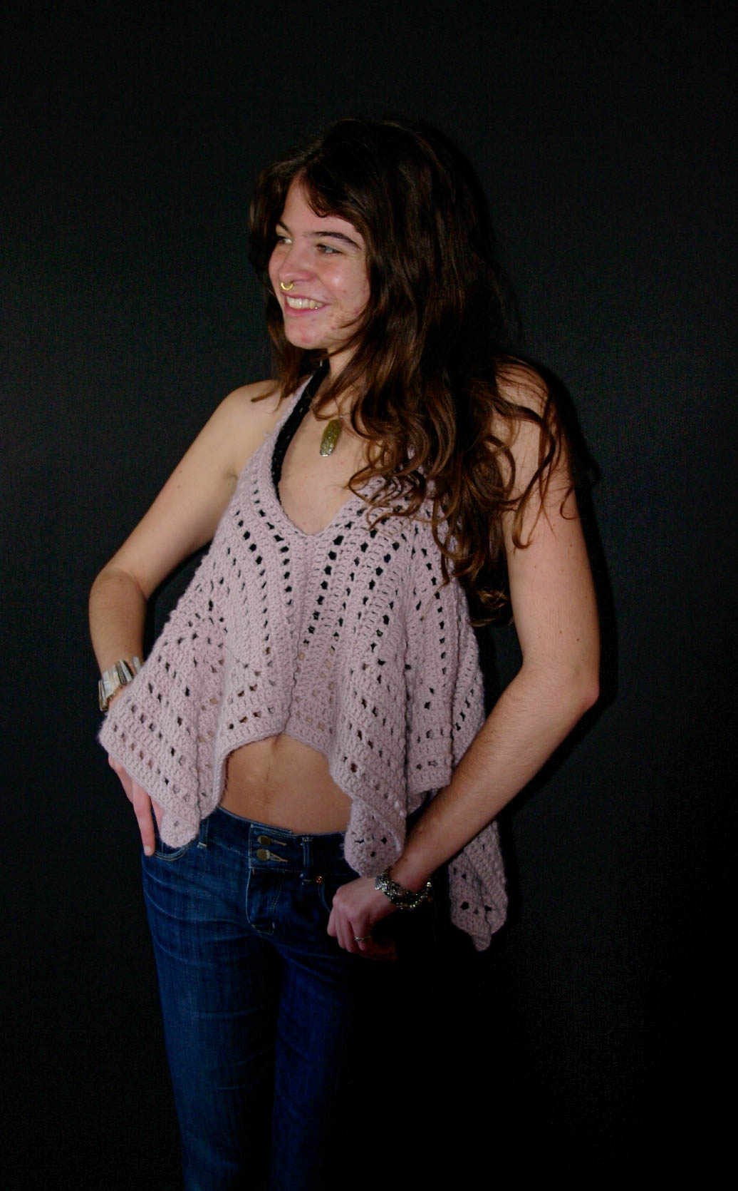 model wearing handmade crochet piece