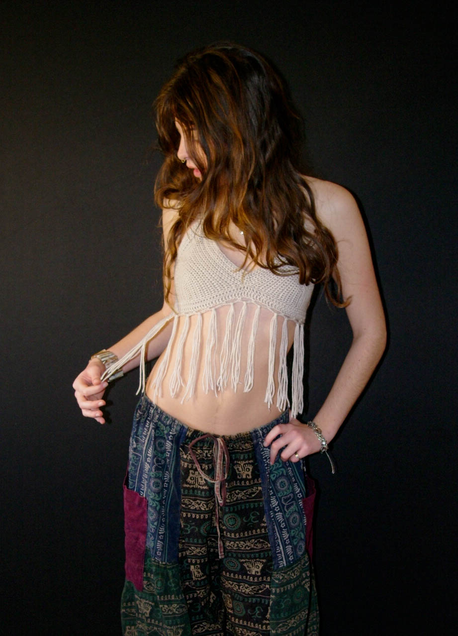 model wearing handmade crochet piece