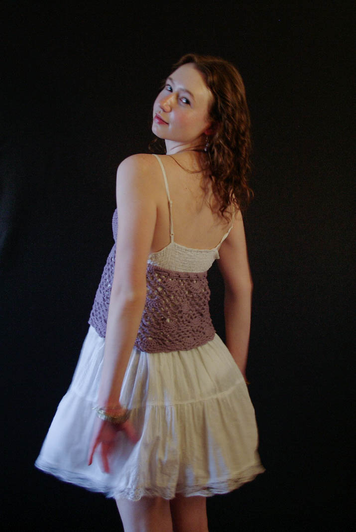 model wearing handmade crochet piece