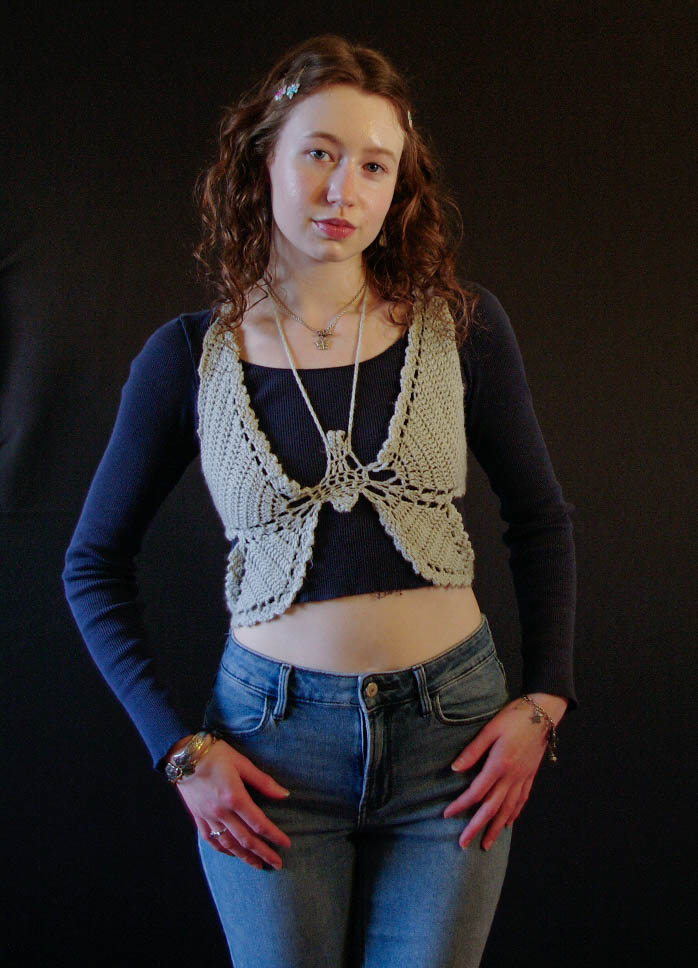 model wearing handmade crochet piece