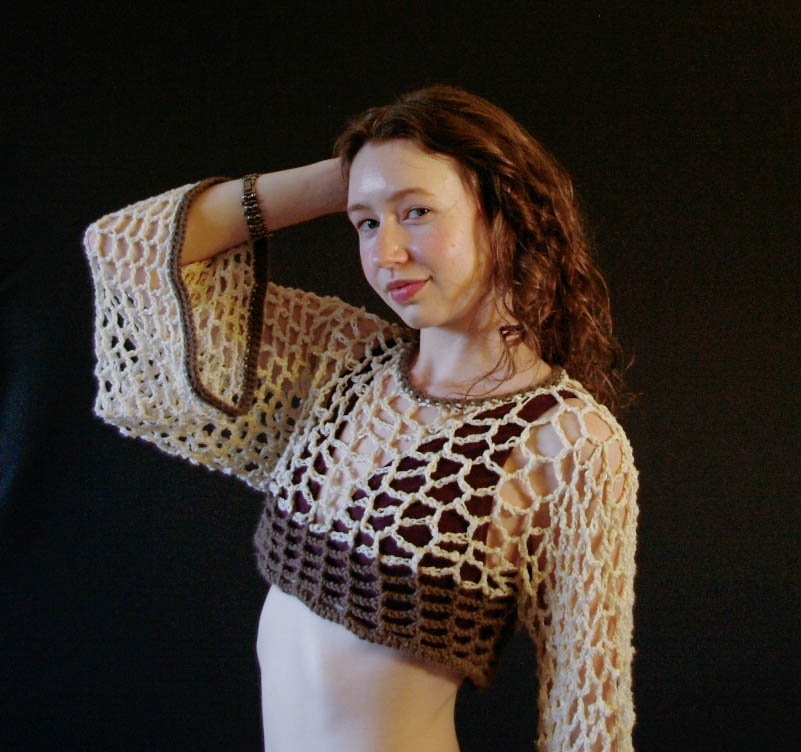 model wearing handmade crochet piece