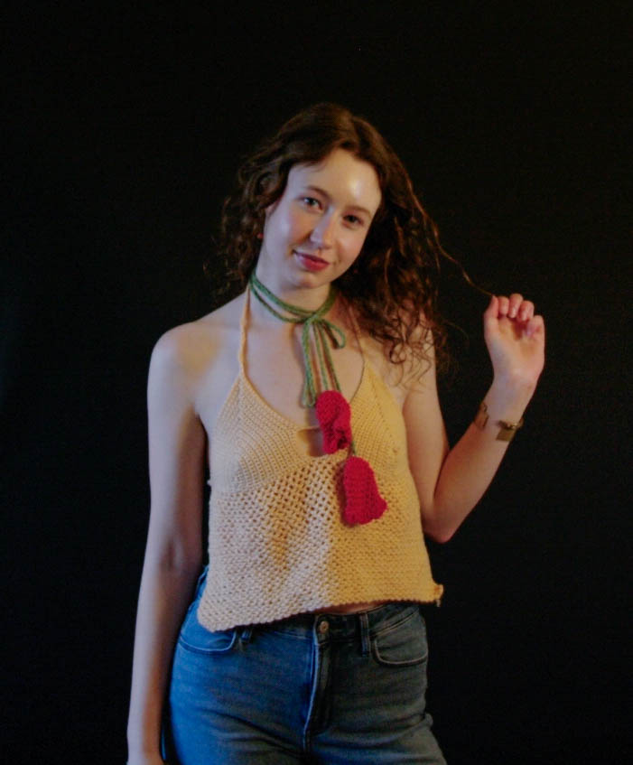 model wearing handmade crochet piece