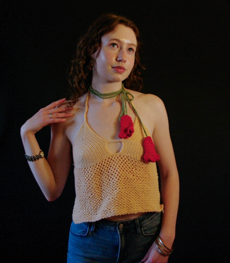 model wearing handmade crochet piece