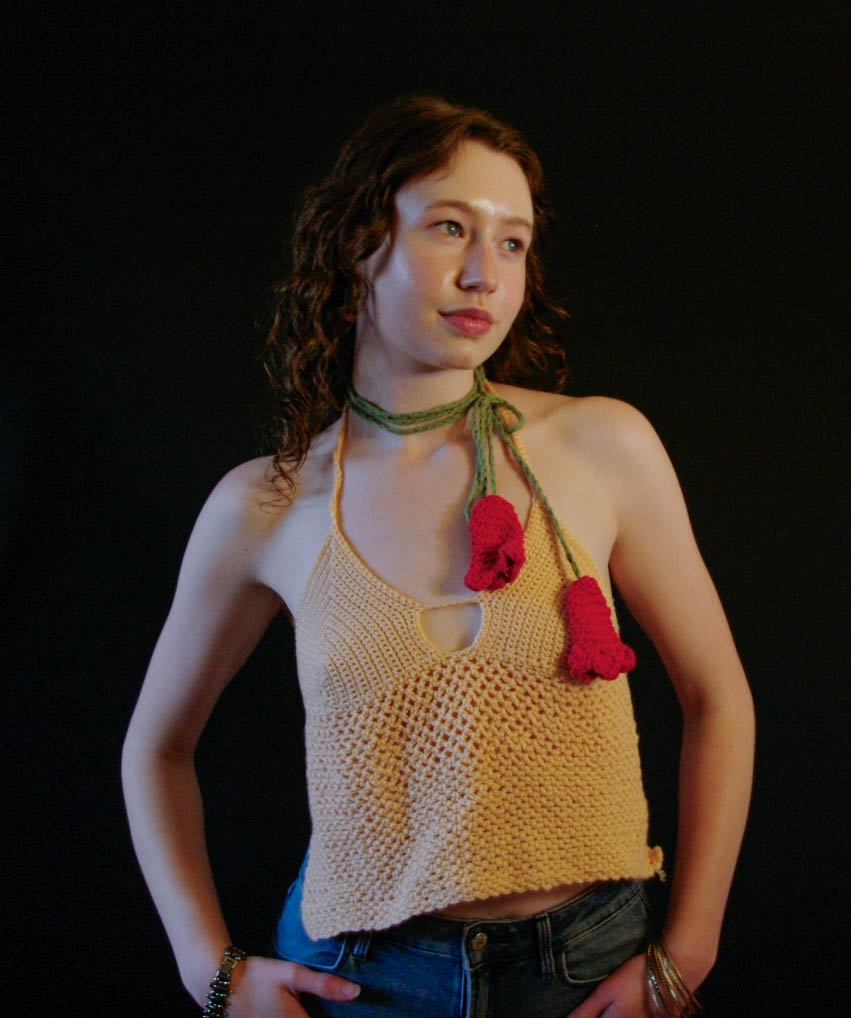 model wearing handmade crochet piece