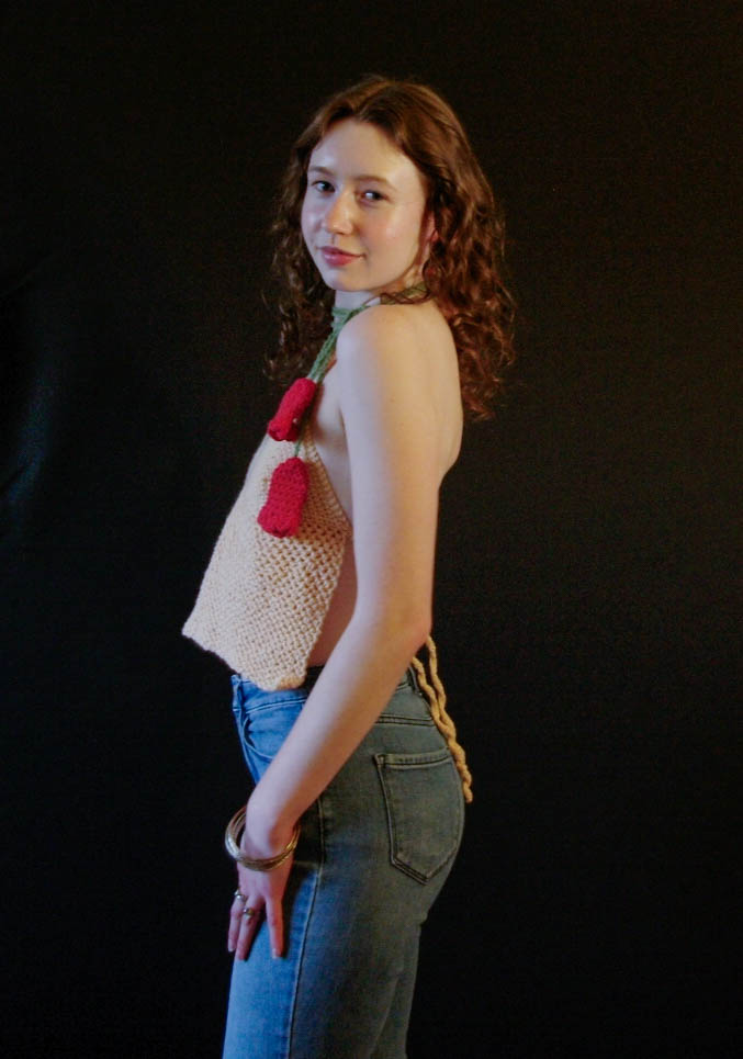 model wearing handmade crochet piece
