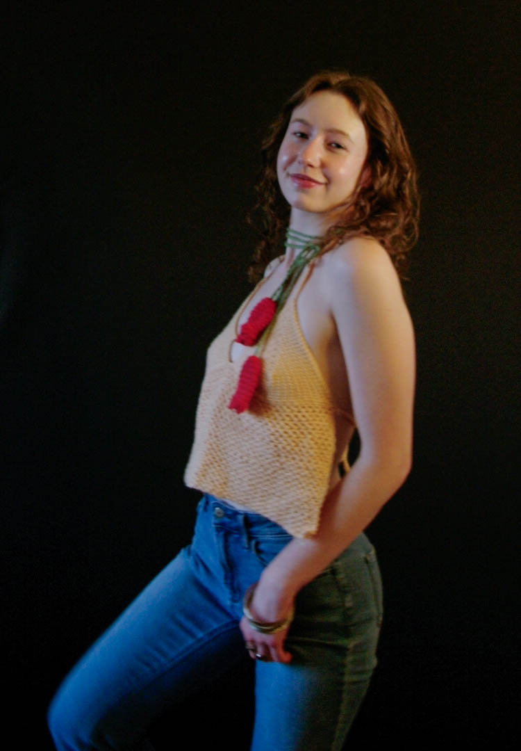 model wearing handmade crochet piece
