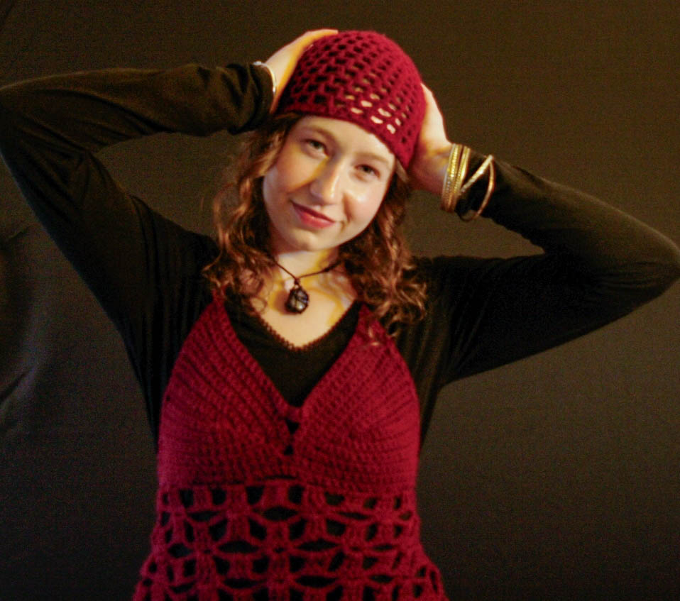 model wearing handmade crochet piece