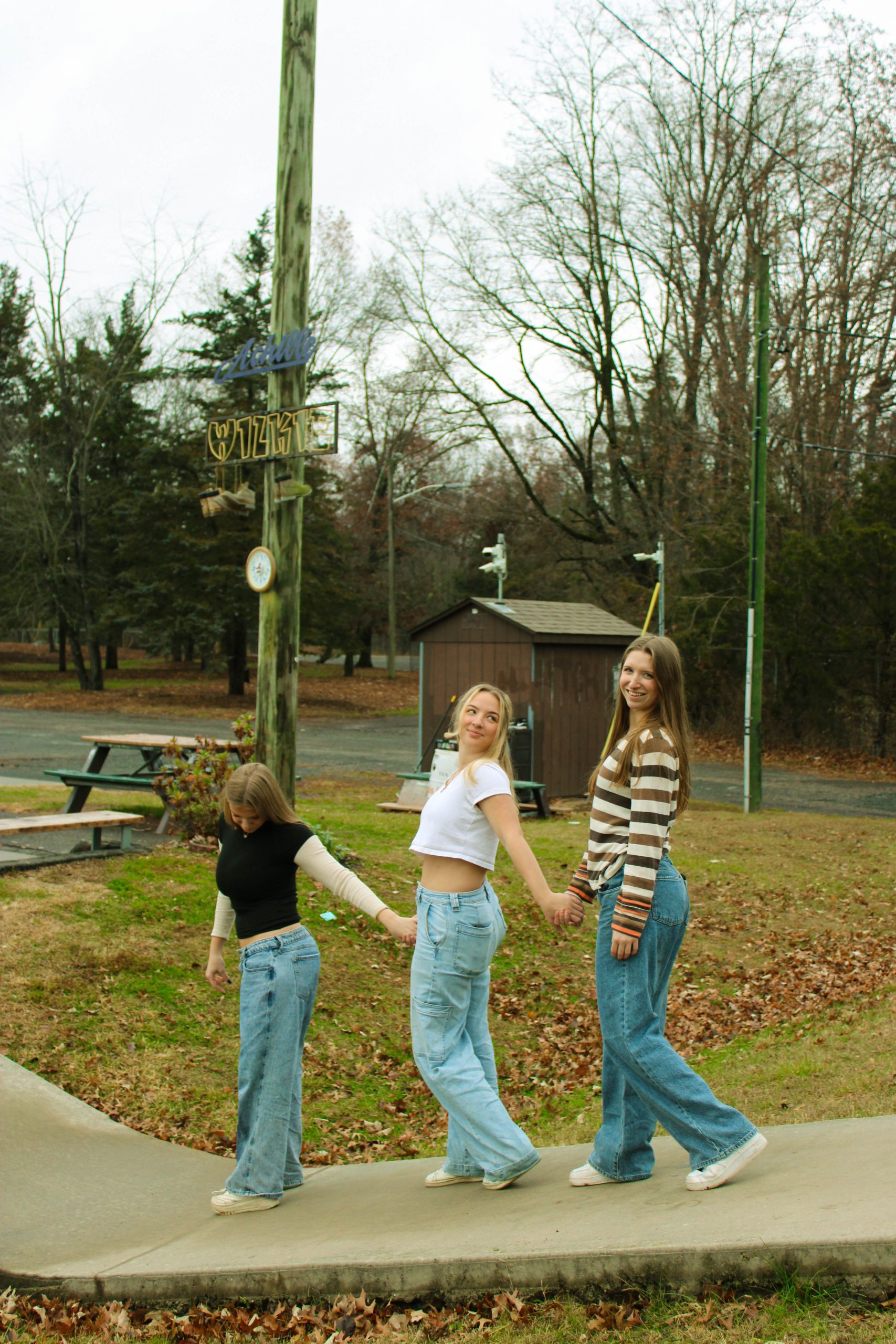 3 models posing with each other