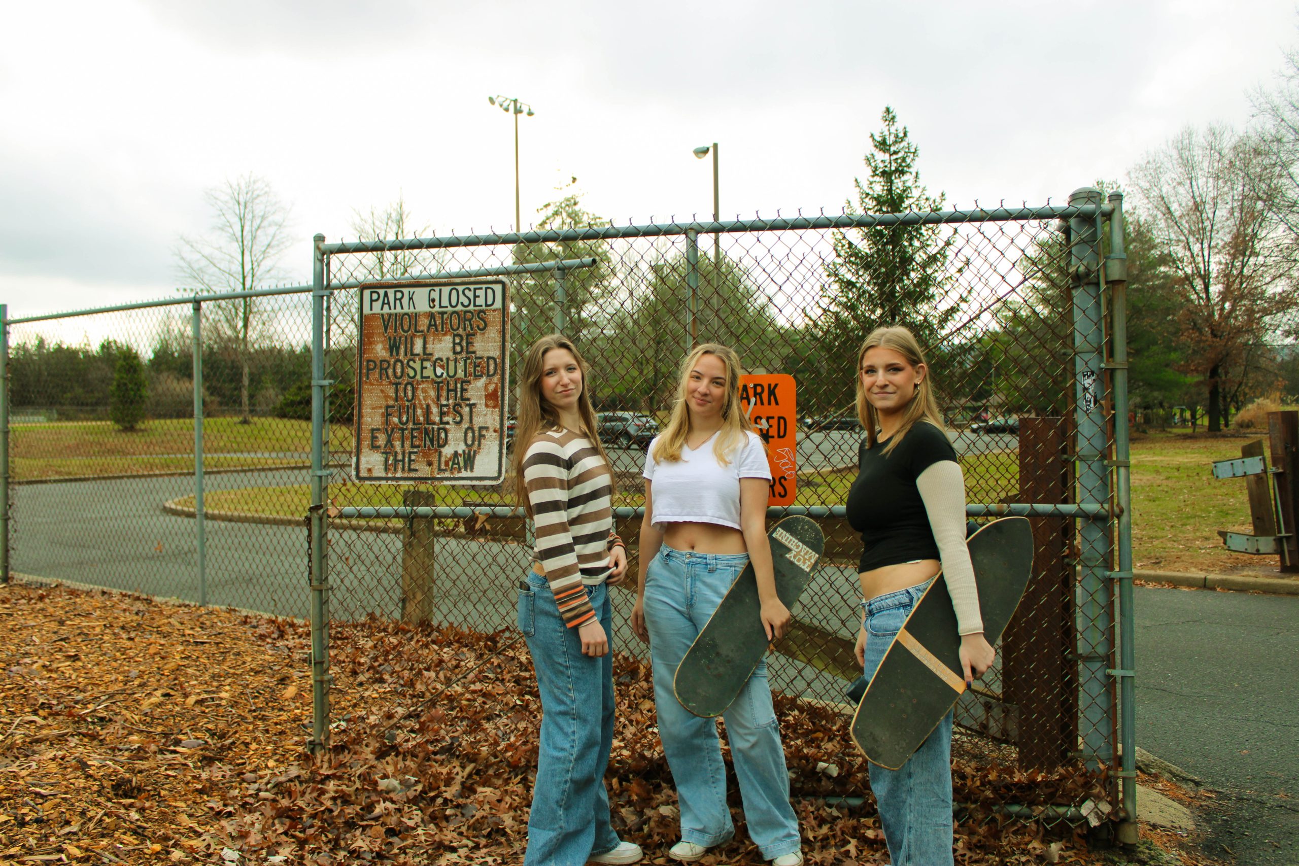 3 models posing with each other