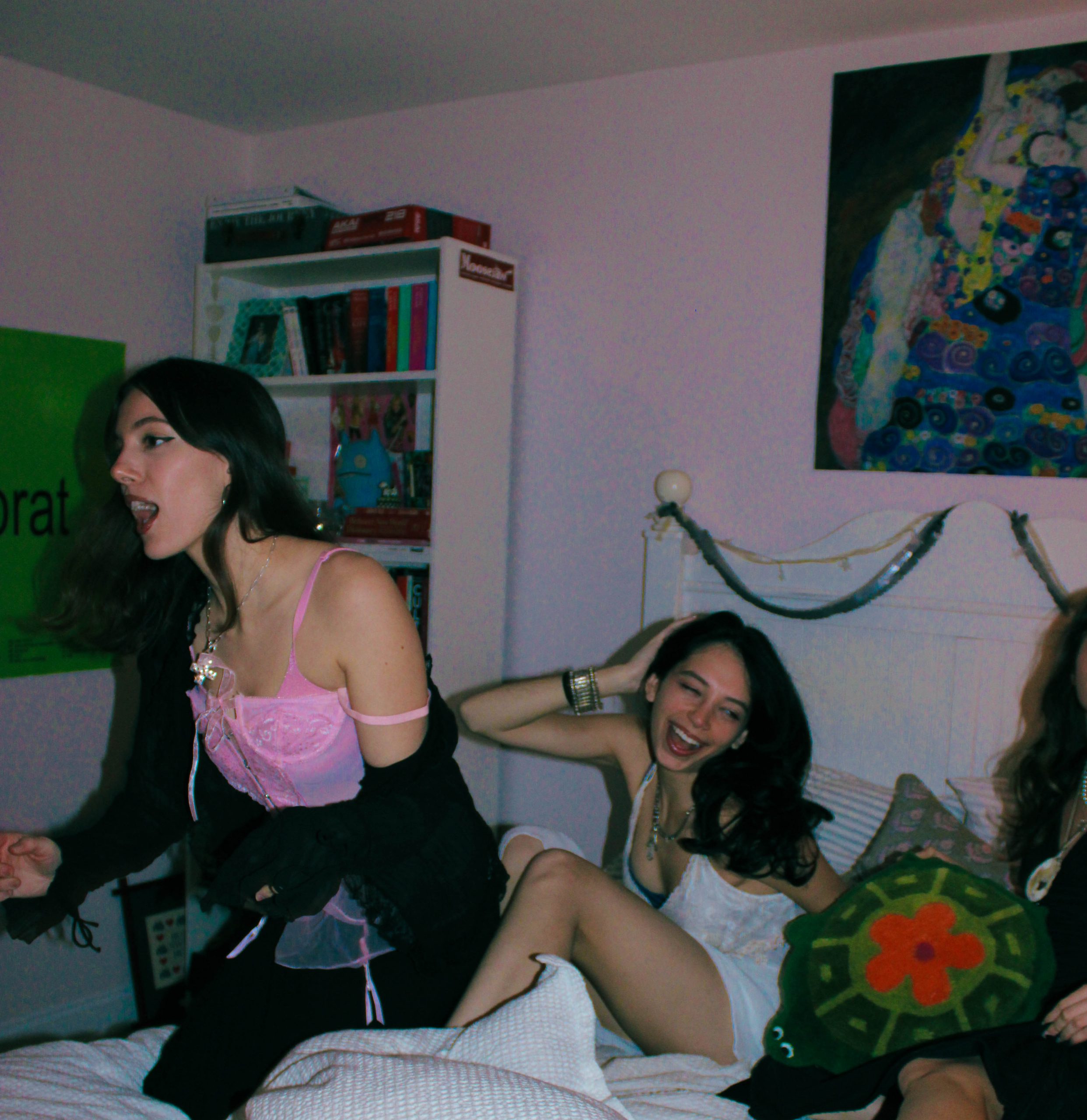 3 models having a pillow fight
